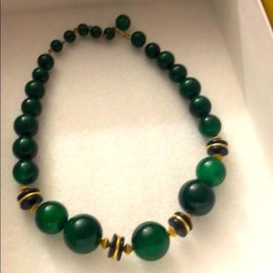 Vintage necklace. Antique. Green plastic balls.